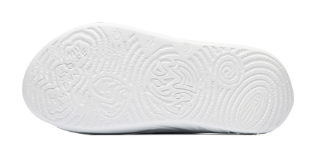 White slide sandal outsole with textured grip pattern