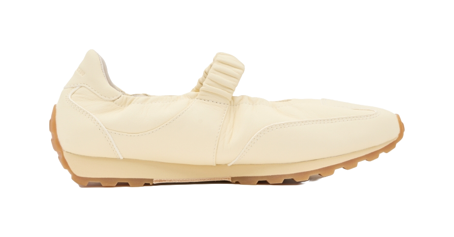 Light yellow Mary Jane low-top shoes with top strap and curved toe design