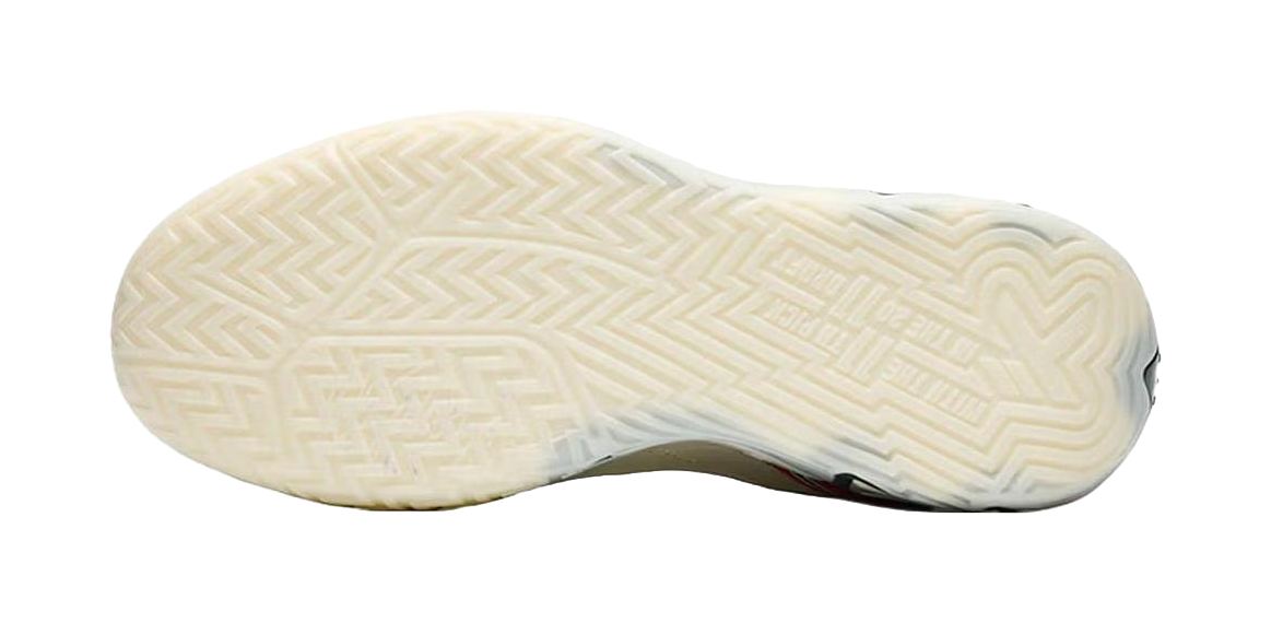 Beige basketball shoe outsole with textured herringbone tread pattern.