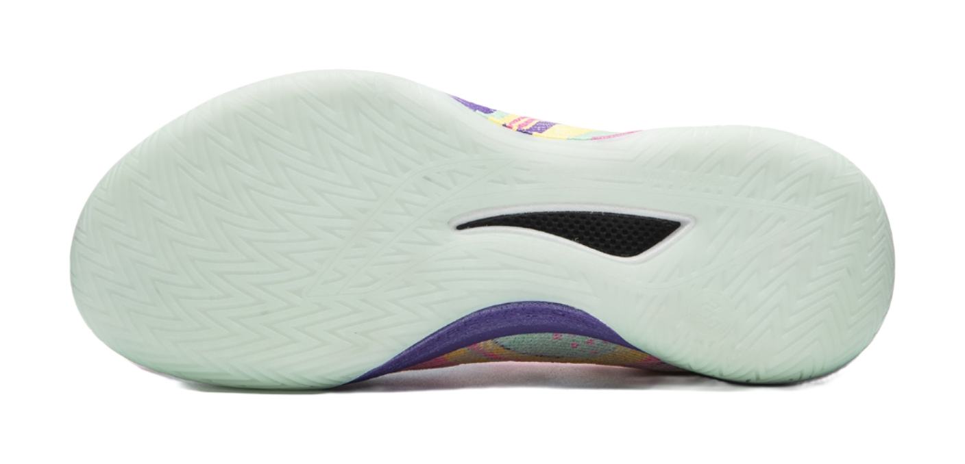 Basketball shoe outsole side profile with mint rubber tread and dark logo panel.
