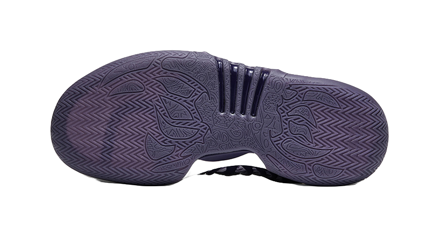 Purple basketball shoe outsole with textured tread pattern