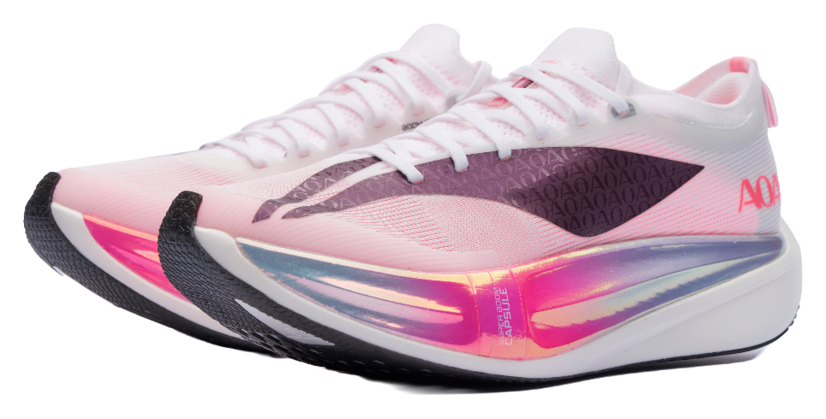 White and pink low running shoe with black stripe overlay and AOA logo on side