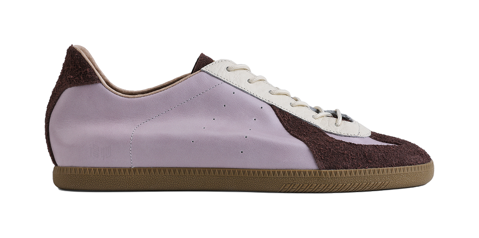Lavender low-top sneaker with dark brown toe and side panels, white lace-up, gum sole