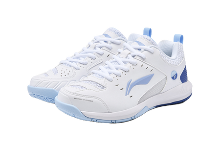 Pair of white badminton shoes with blue detailing, laces, and textured side panels