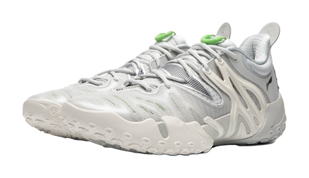 Unisex basketball shoe side view, white knit upper with light gray panels and green trim