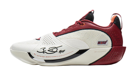 White and red basketball shoe with red laces, perforated side, and beige midsole