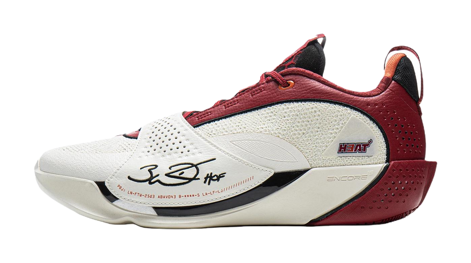 White and red basketball shoe with red laces, perforated side, and beige midsole