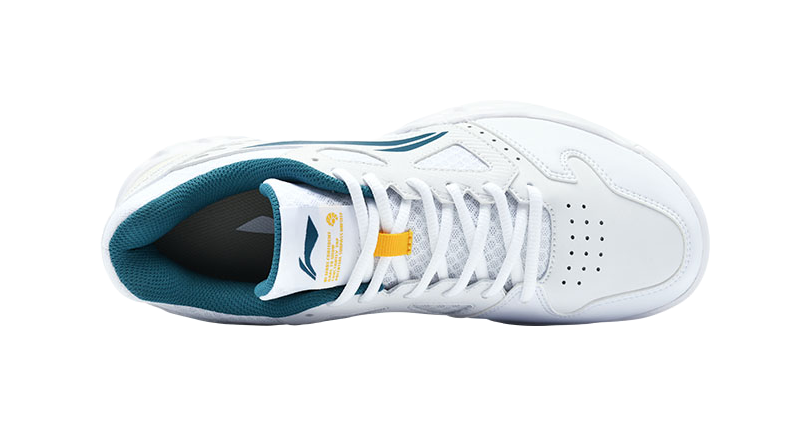 White badminton shoe with teal interior lining, lace-up front, cushioned tongue.
