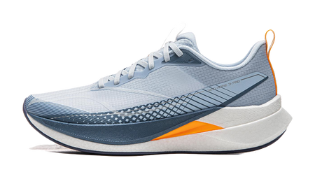 Light blue running shoe with navy stripe design and orange heel accent