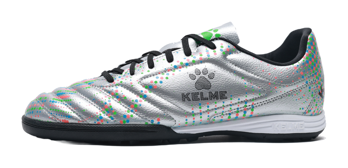 Silver unisex TF turf soccer shoe with black laces and multicolor dot pattern, KELME