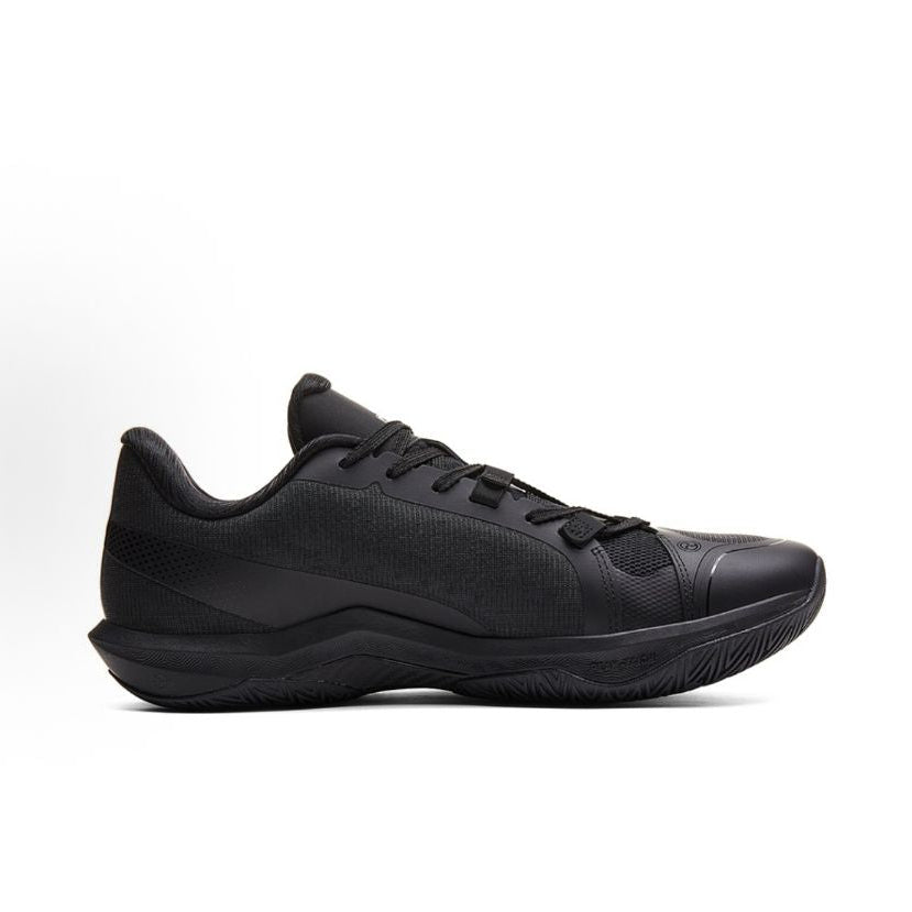 Black unisex basketball shoe, lateral side profile with lace-up closure