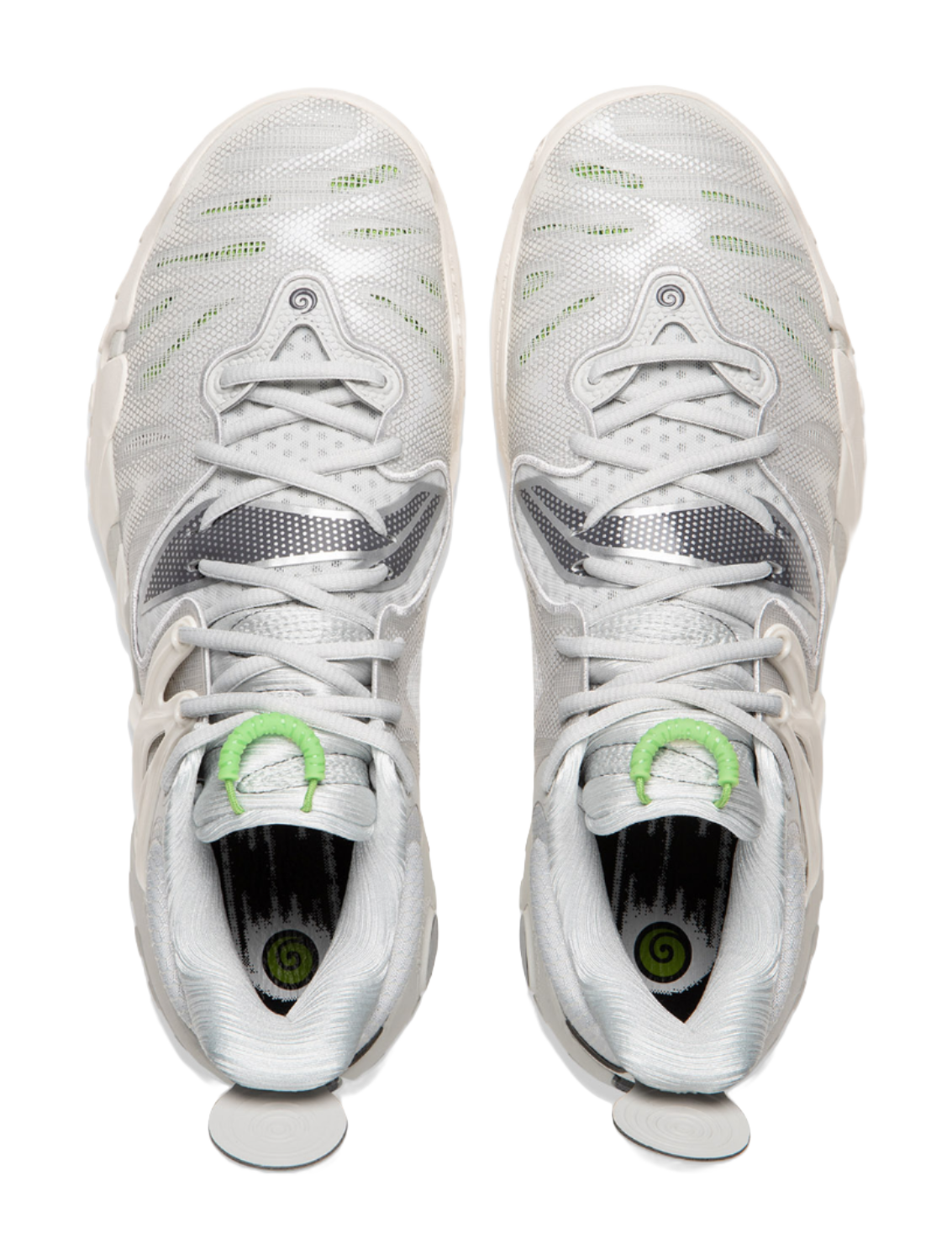 Pair of unisex basketball shoes in white with green lace loops and padded collar