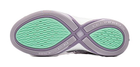 Lavender outsole of low basketball shoe with green tread and cross-strap pattern