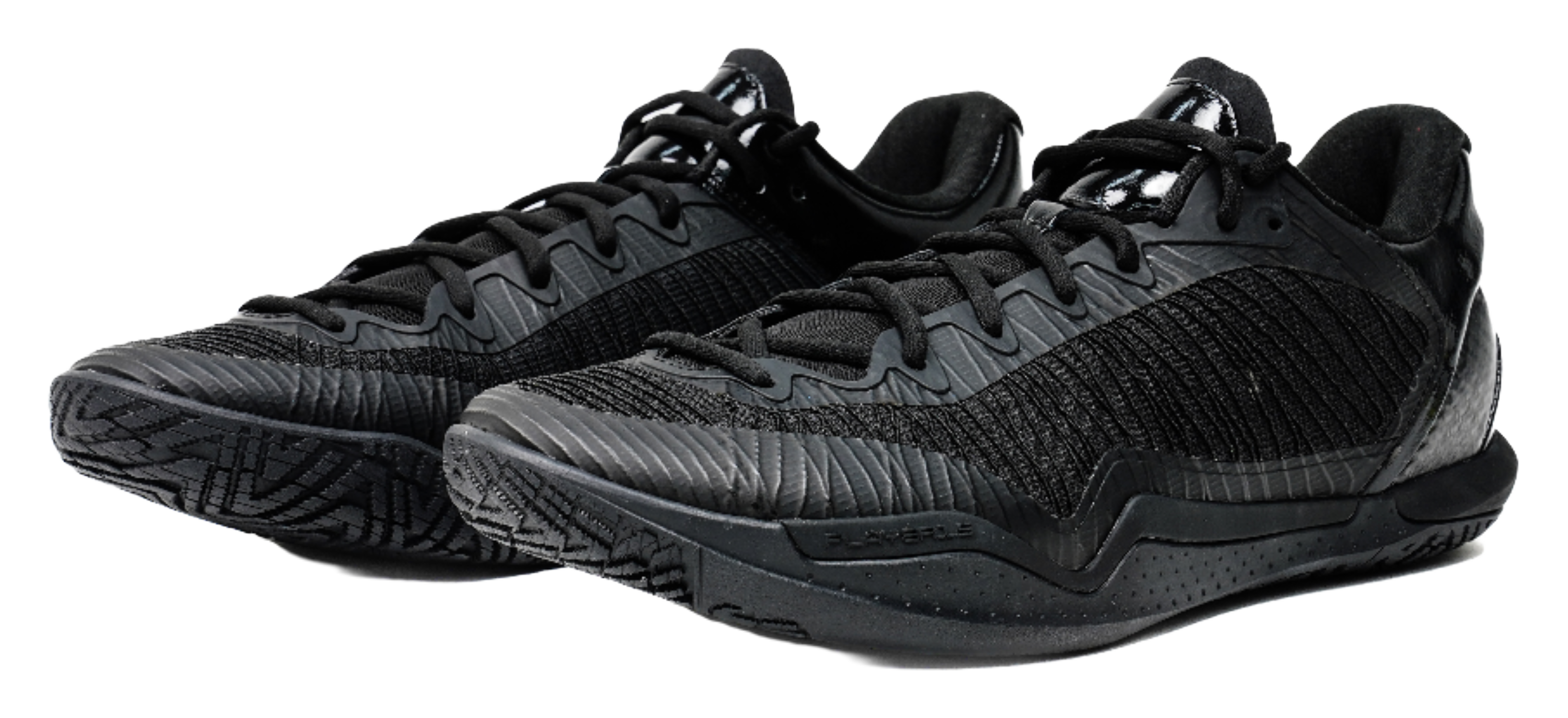 Black low-top basketball shoes, side-by-side view with lace and textured pattern.