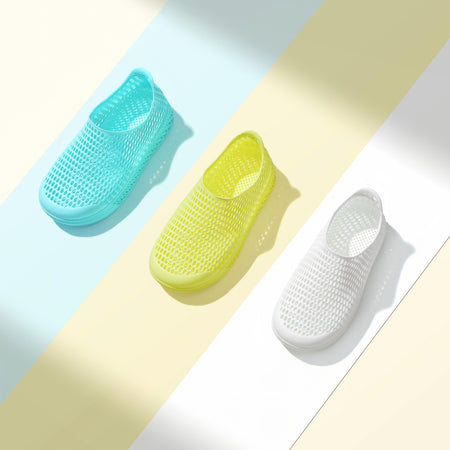 Kids 3D printed slip-on shoes in light blue, yellow, and white