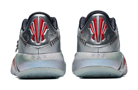 Low basketball shoe heels, silver-gray with black back, red logo and textured sole