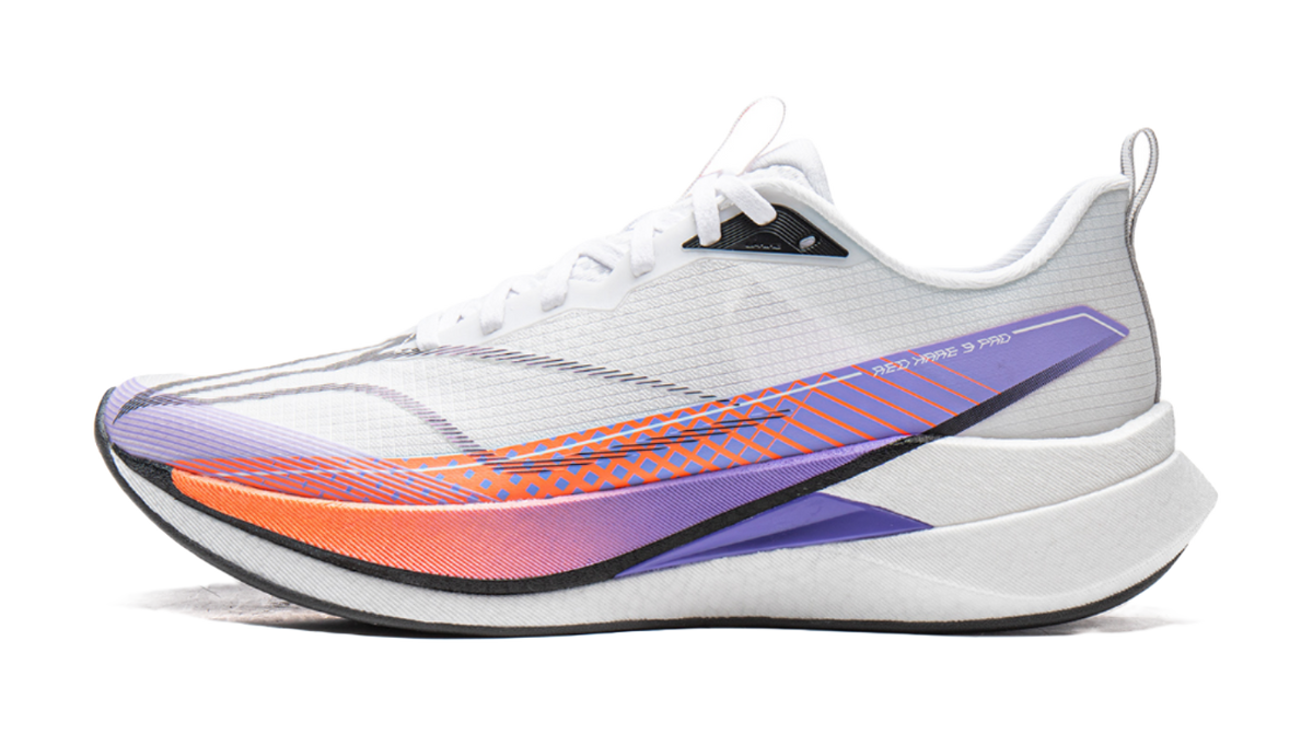White running shoe with purple and orange side accents and knit upper
