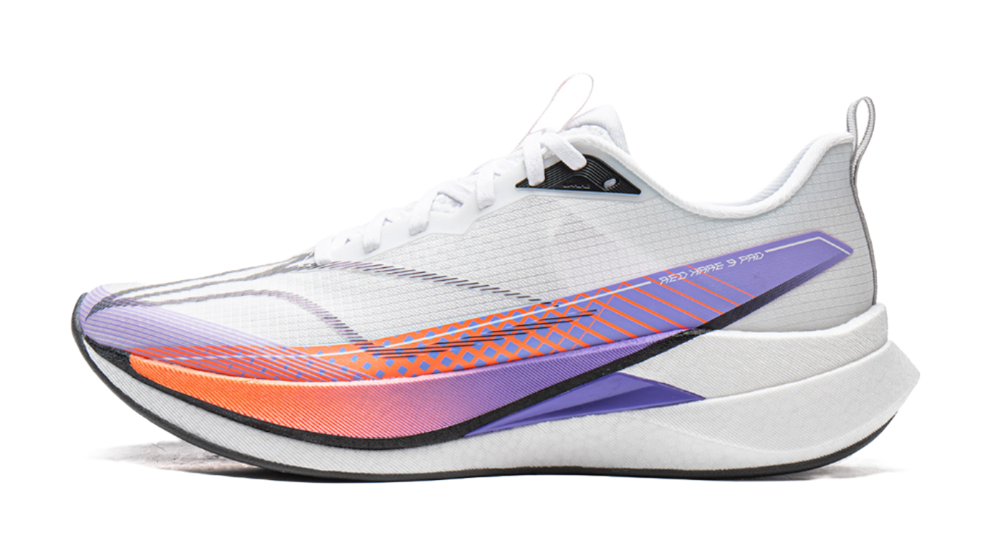 White running shoe with purple and orange side accents and knit upper