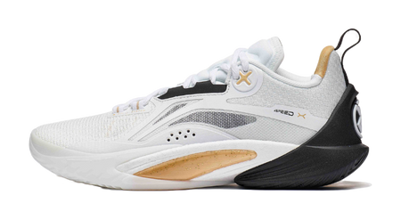 White and black basketball shoe with gold X logo at side, lace-up knit upper
