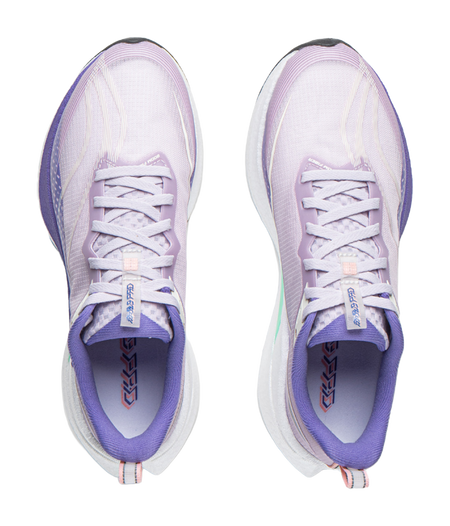 Pair of lavender purple and white running shoes with white laces and purple collars