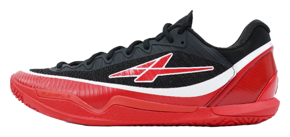 Low-top basketball shoe in black, red and white with grippy outsole