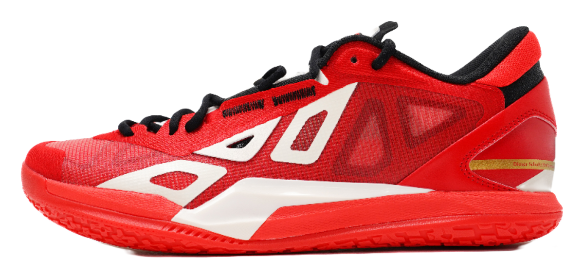 Red low-top basketball shoe with black laces and white logo panels