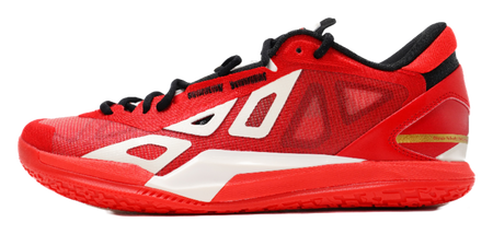 Red low-top basketball shoe with black laces and white logo panels