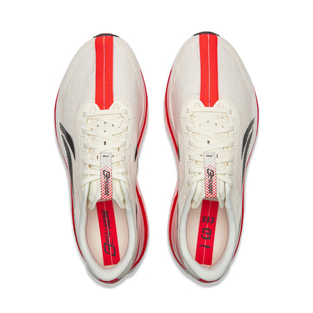 Champagne white running shoes pair with white laces and red heel stripe, top view