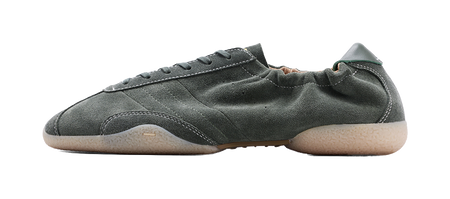 Dark green low-top sneakers with lace-up front and rubber sole