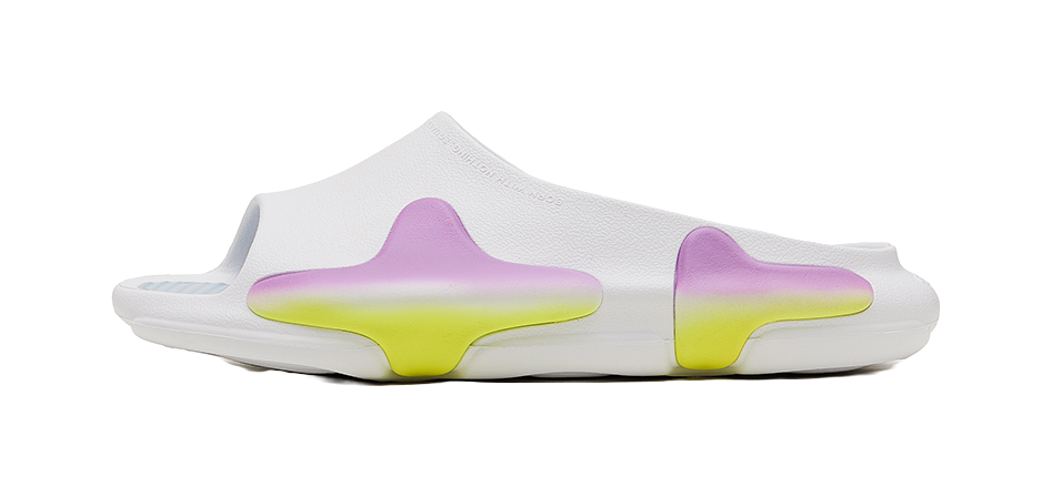 White slide slippers with purple and yellow Sunrise trim, cushioned footbed.