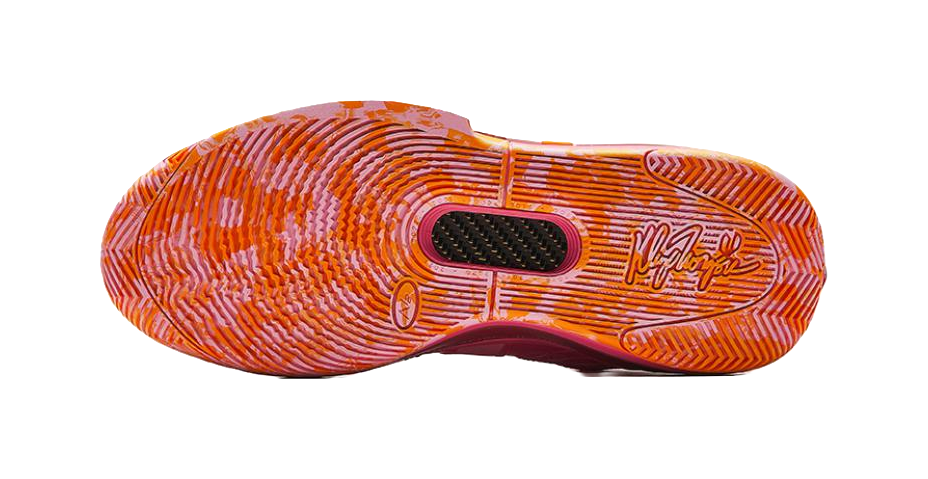 Orange basketball shoe outsole with multidirectional traction tread
