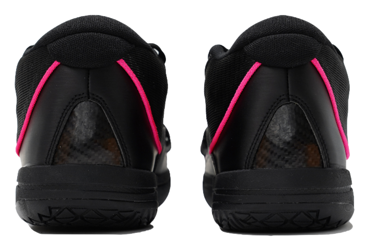 Black high-top heel view with pink trim and textured outsole edge