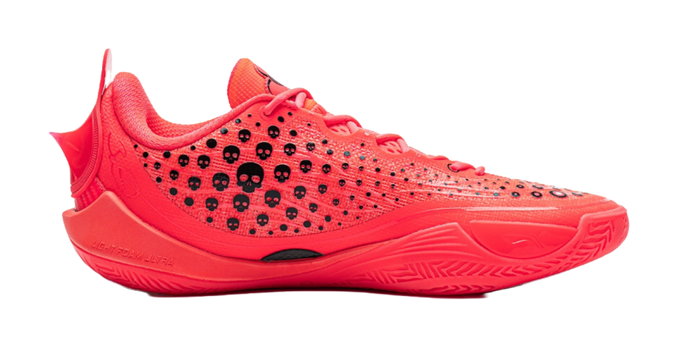 Fluorescent red low-top basketball shoe with speckled knit and black side accents