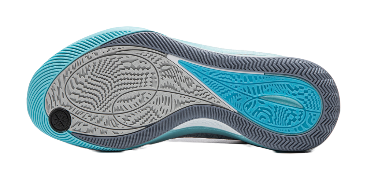 Men's low-top basketball shoe outsole tread, gray with blue traction zones