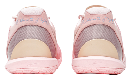 Pink low-cut basketball shoes with cushioned heel and breathable collar lining