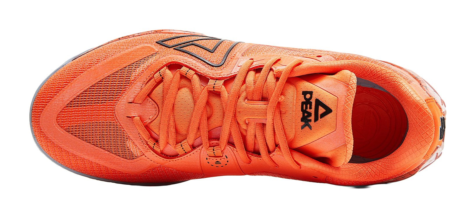 Orange basketball shoe, top view of tongue and laces, black side logo