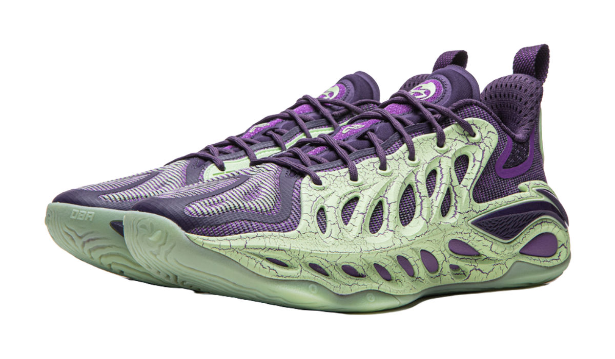 Purple and green basketball shoe angled front view, lace-up with sculpted side