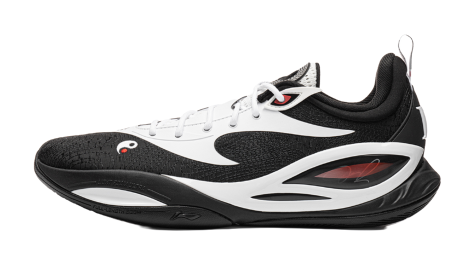 Black and white basketball shoe side view with white toe and black collar