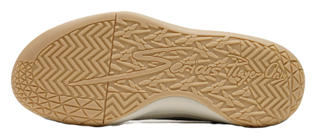 Unisex basketball shoe outsole in gum rubber with zigzag tread pattern