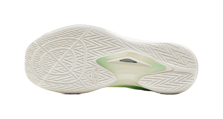 Lightweight basketball shoe outsole with white rubber traction and green heel detail