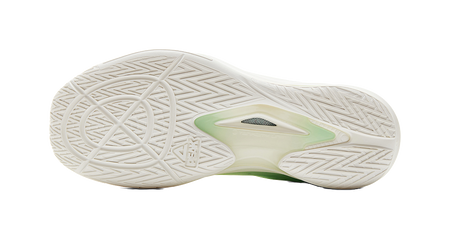 Lightweight basketball shoe outsole with white rubber traction and green heel detail