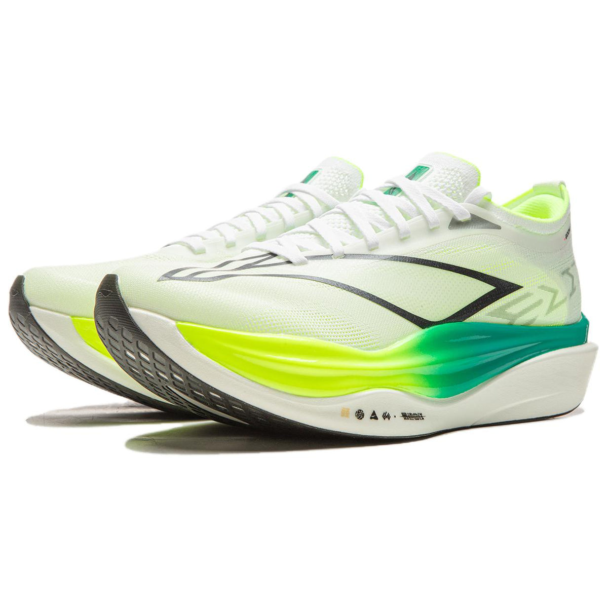 White and green racing shoes with black side stripe, neon outsole, lace-up.