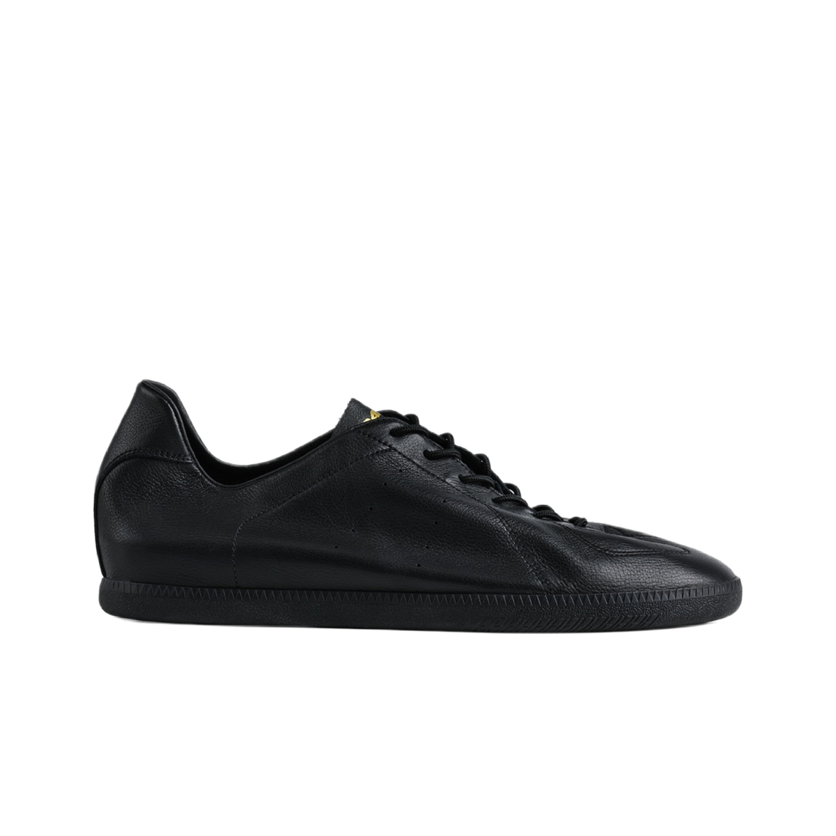 Black low-top lace-up training sneaker with smooth leather upper and rubber sole.