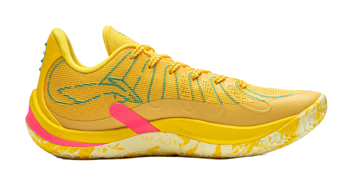 Lemon yellow low-top basketball shoe with lace-up closure and green side graphic