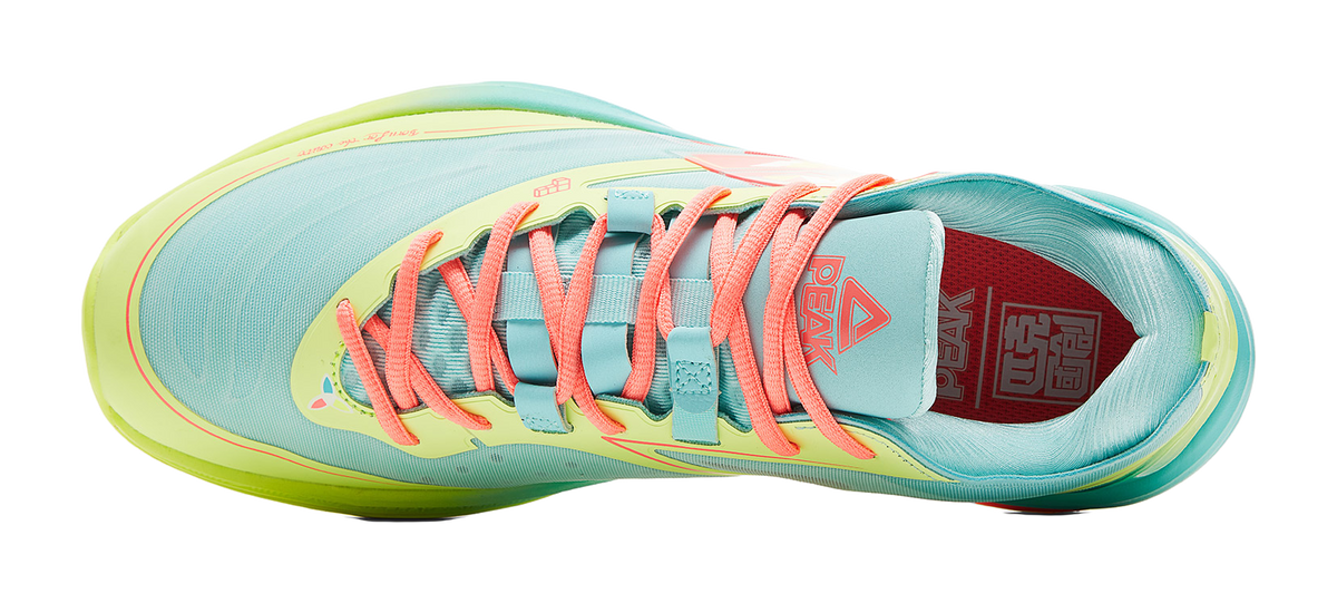 Lightweight basketball shoe heel and tongue, ice blue with coral laces and red interior lining