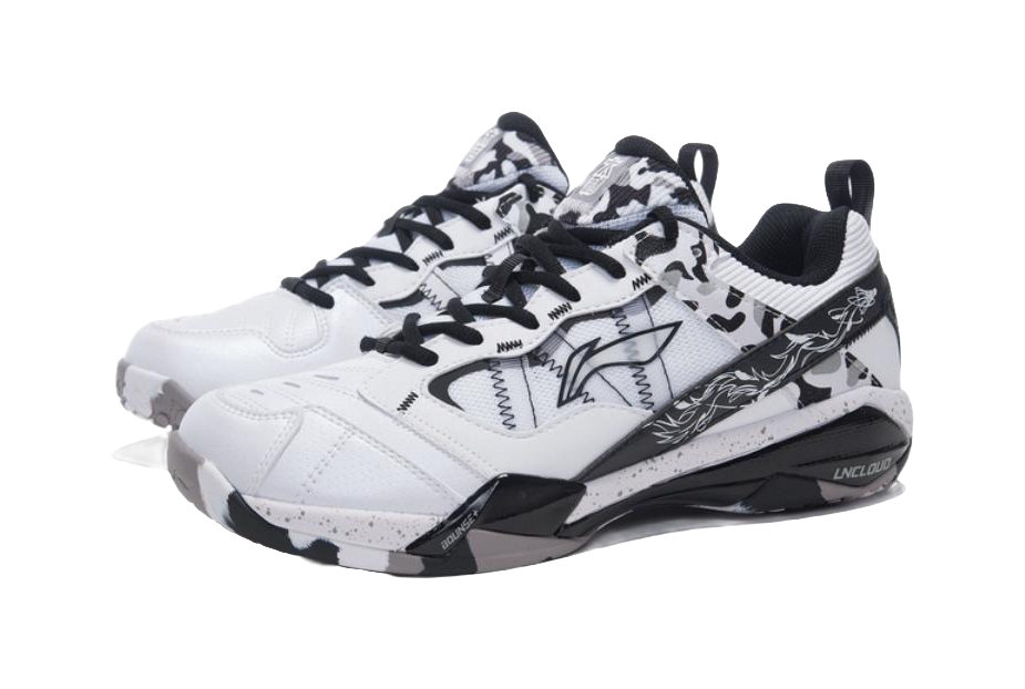 Unisex badminton shoe front/side view, white with black camo panels and black accents