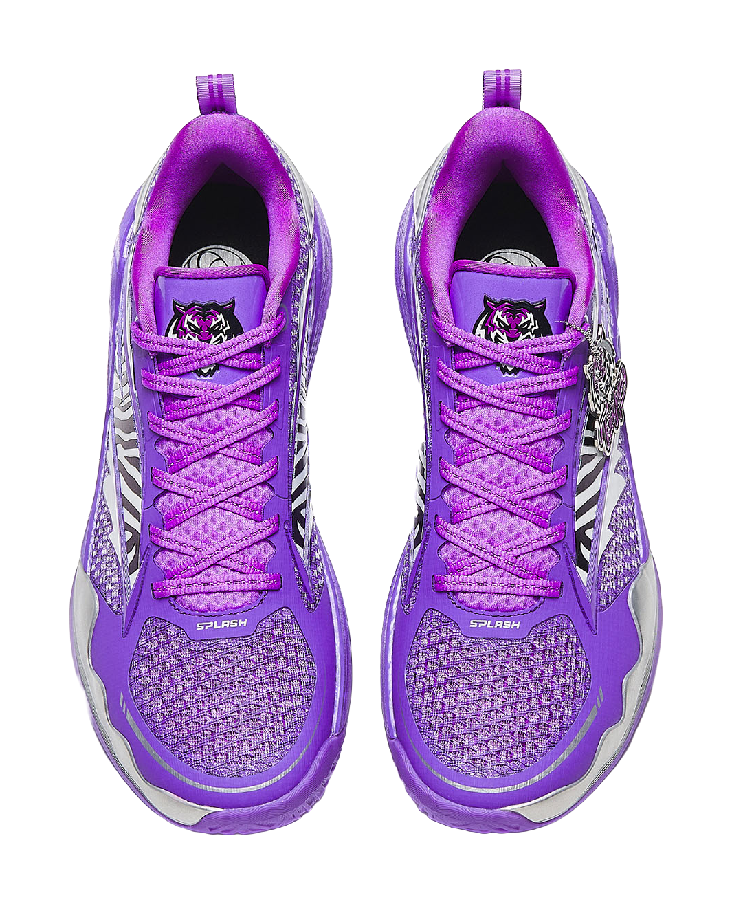 Purple lace-up basketball shoes with textured mesh panels and logo at the tongue.