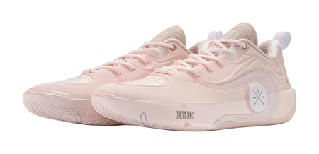 Two light pink basketball shoes, lace-up with textured side detailing and logo