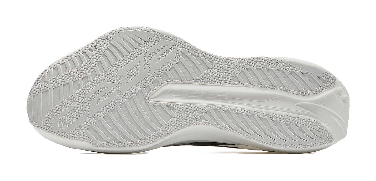 White rubber outsole with detailed tread pattern for grip and traction
