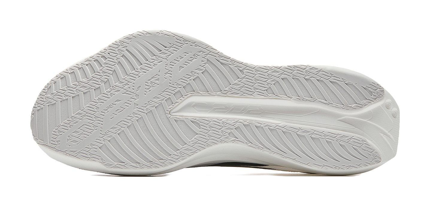 White rubber outsole with detailed tread pattern for grip and traction